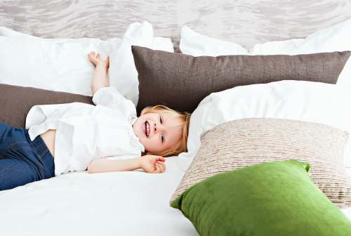 los angeles boy lying on bed united states